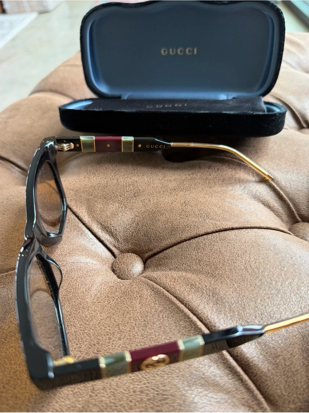 Gucci Black Frame Sunglasses with Amber Lenses